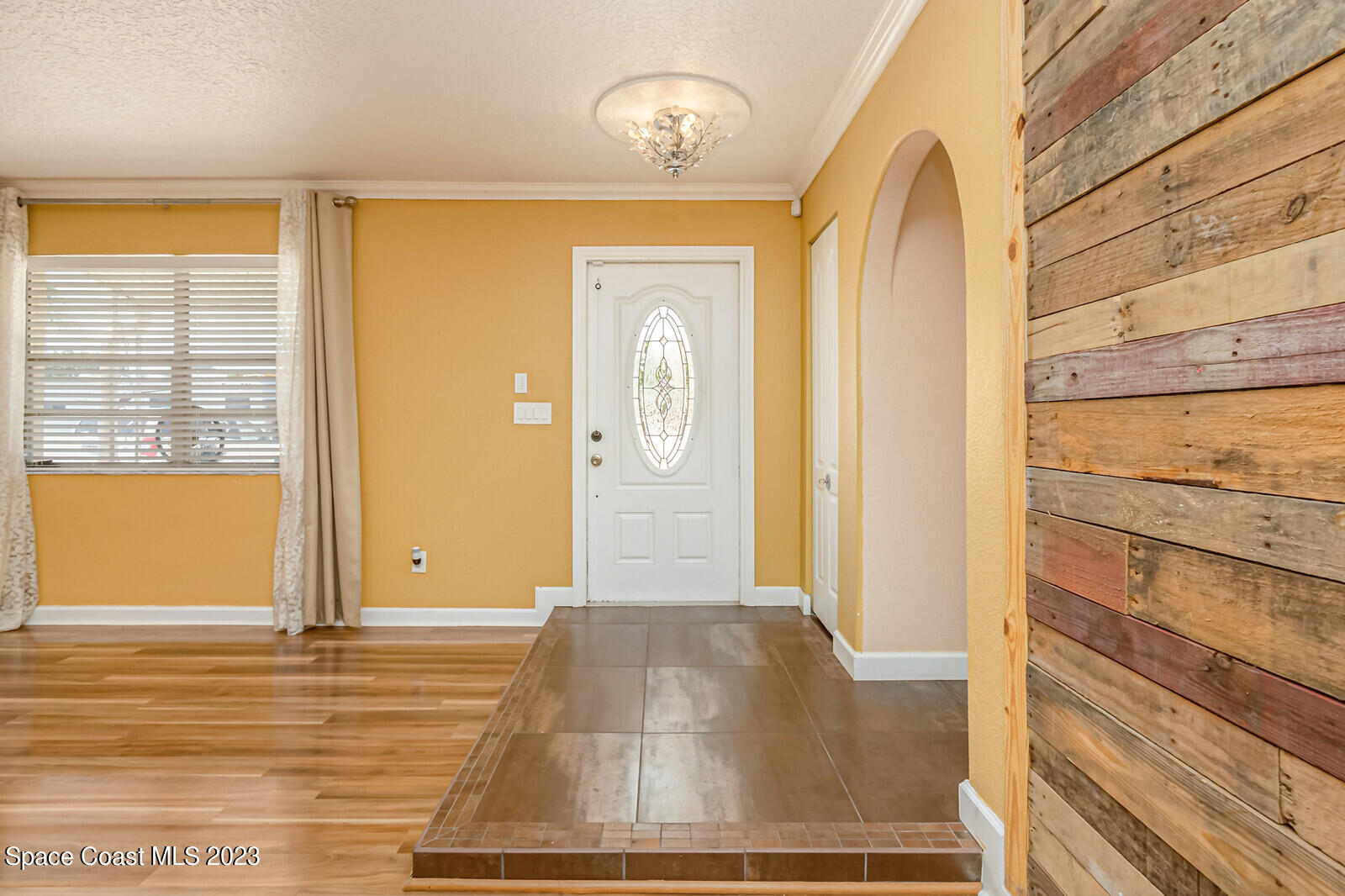 2567 Wright Avenue Melbourne, FL 32935 - Photo 15 of 36 a view of front door