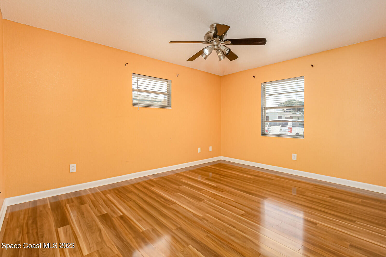 2567 Wright Avenue Melbourne, FL 32935 - Photo 21 of 36 a view of an empty room and wooden floor