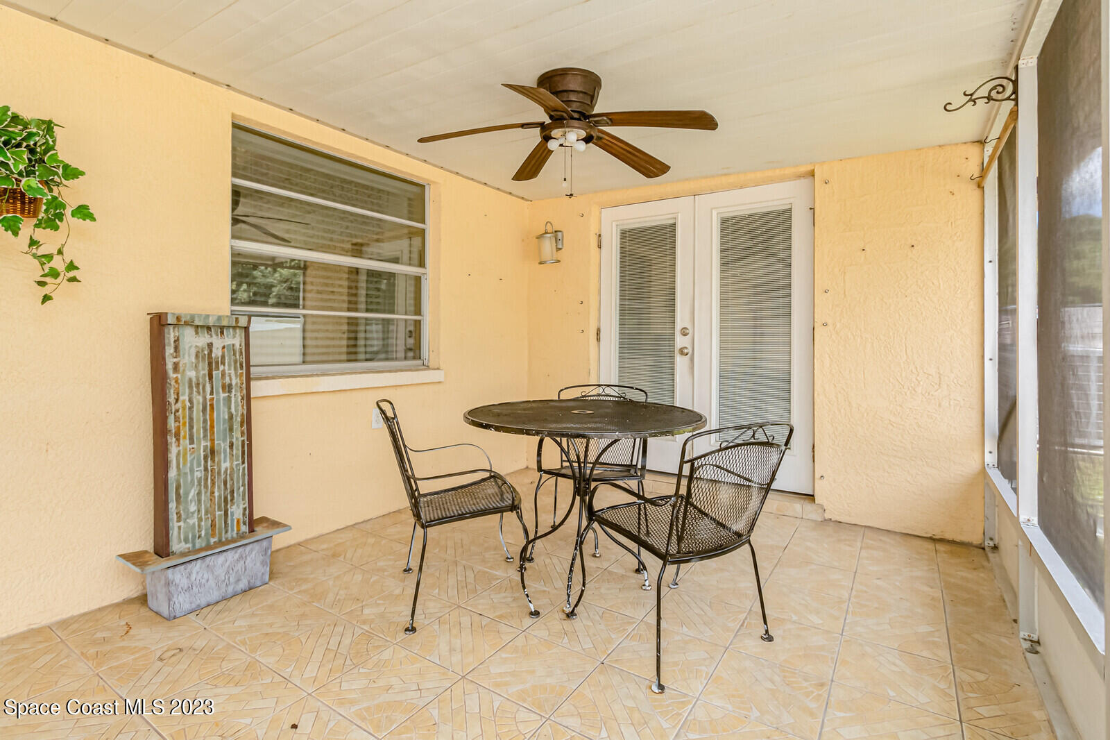2567 Wright Avenue Melbourne, FL 32935 - Photo 29 of 36 a view of a dining room with furniture and a window