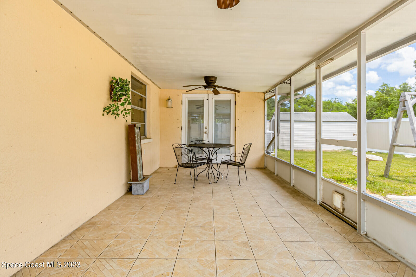 2567 Wright Avenue Melbourne, FL 32935 - Photo 30 of 36 a view of a room with furniture and large windows