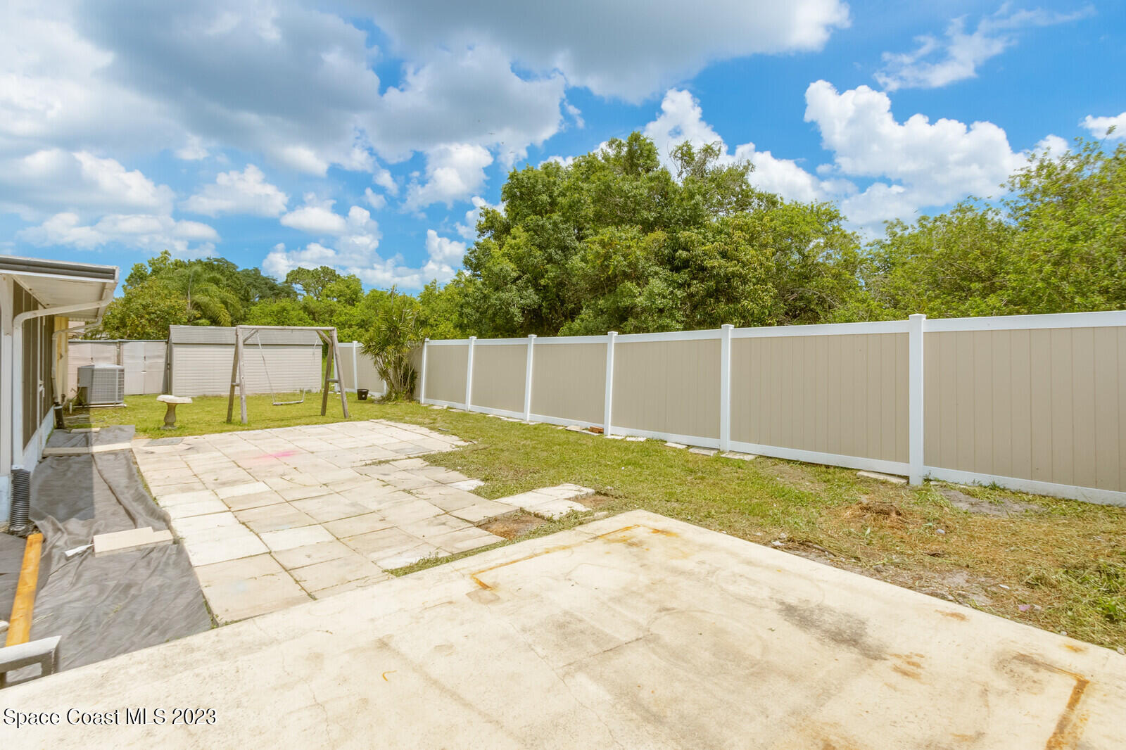2567 Wright Avenue Melbourne, FL 32935 - Photo 35 of 36 a view of backyard with green space