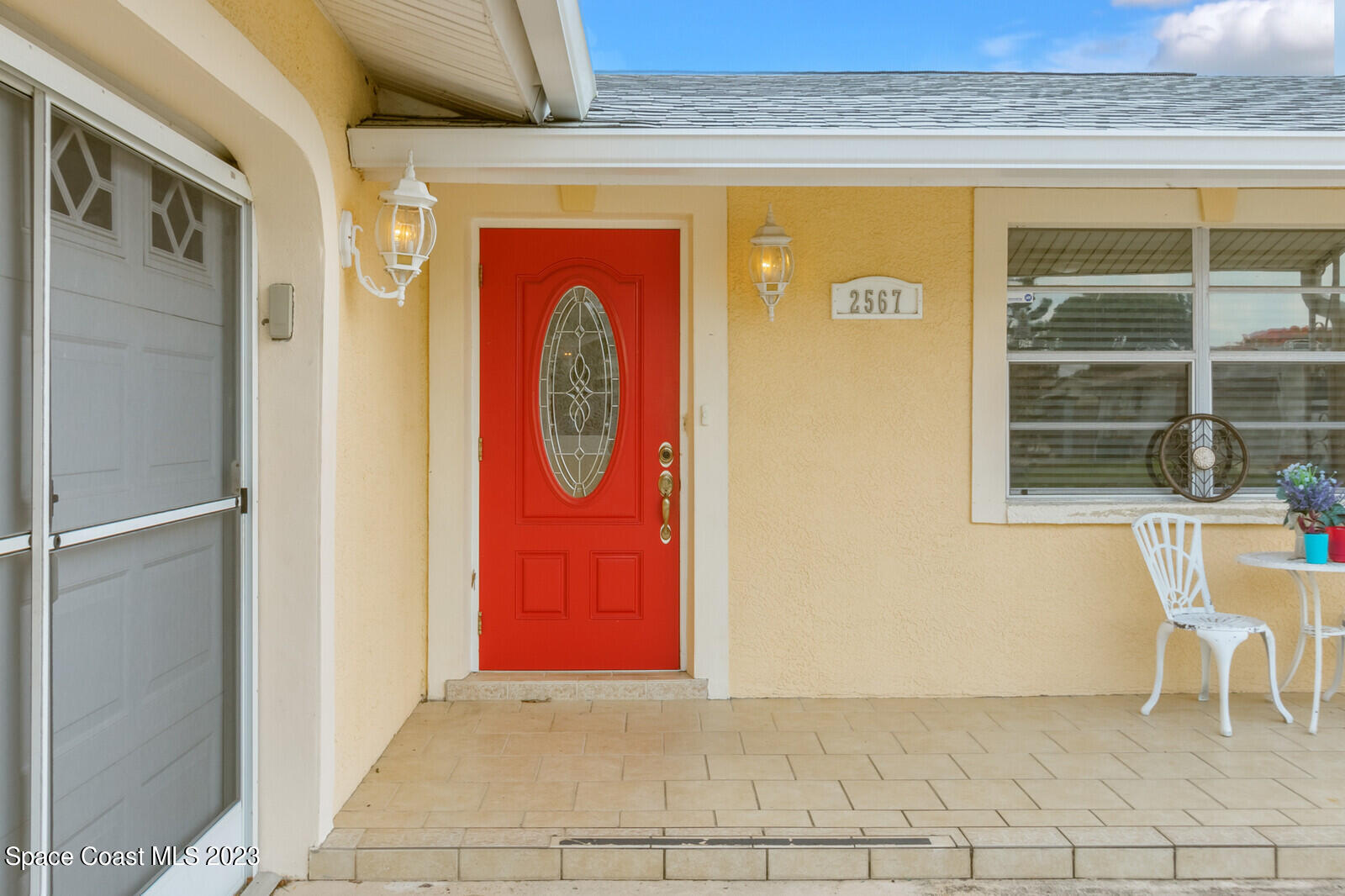 2567 Wright Avenue Melbourne, FL 32935 - Photo 4 of 36 a view of front door of house