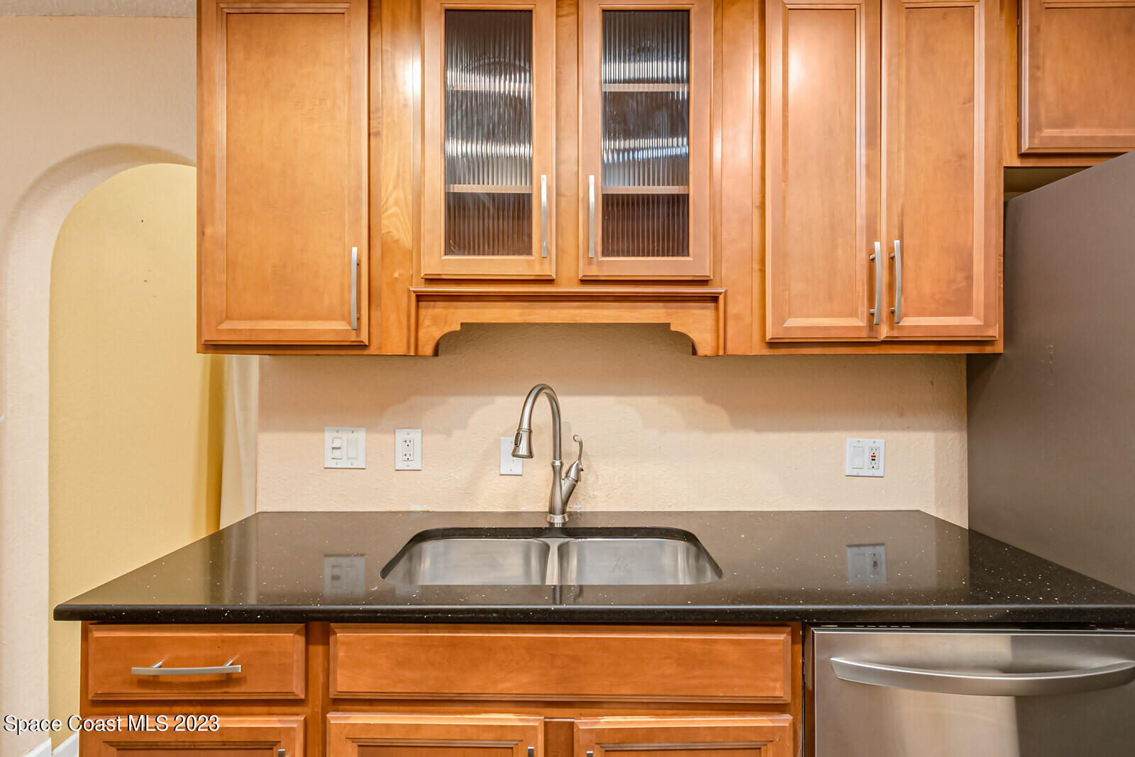 2567 Wright Avenue Melbourne, FL 32935 - Photo 8 of 36 a kitchen with a sink and a window