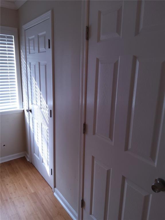 405 Fairburn Road Southwest, Unit 21 Atlanta, GA 30331 - Photo 14 of 16 a view of a hallway with wooden floor and entryway