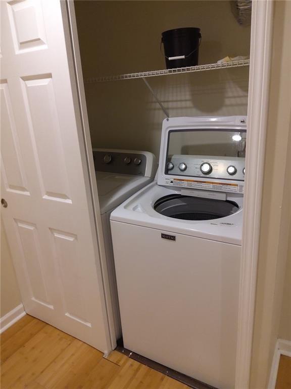 405 Fairburn Road Southwest, Unit 21 Atlanta, GA 30331 - Photo 7 of 16 a close view of washer and dryer
