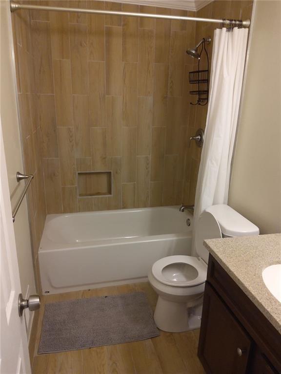 405 Fairburn Road Southwest, Unit 21 Atlanta, GA 30331 - Photo 10 of 16 a bathroom with a toilet and a bathtub