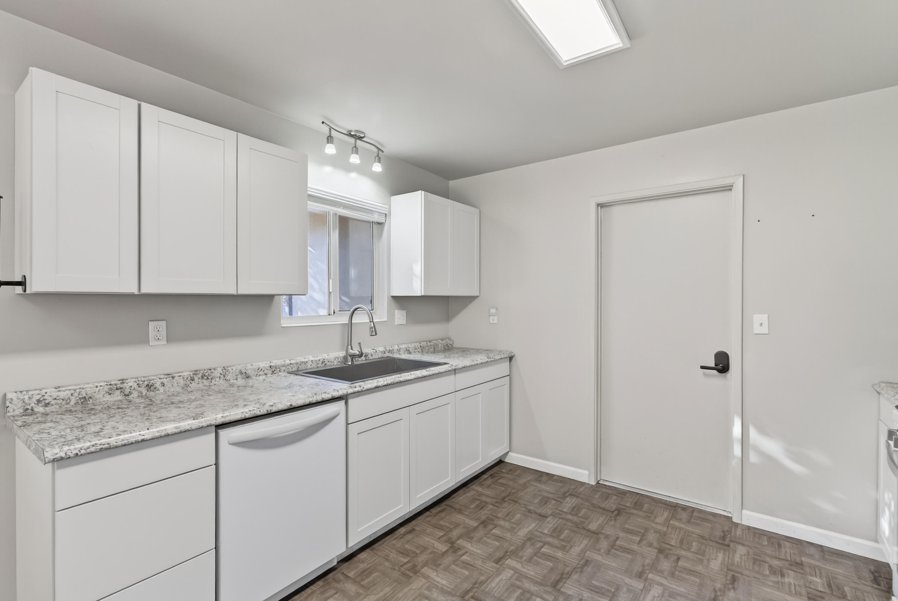 2068 Solar Way Redding, CA 96002 - Photo 13 of 36 a kitchen with a sink and cabinets