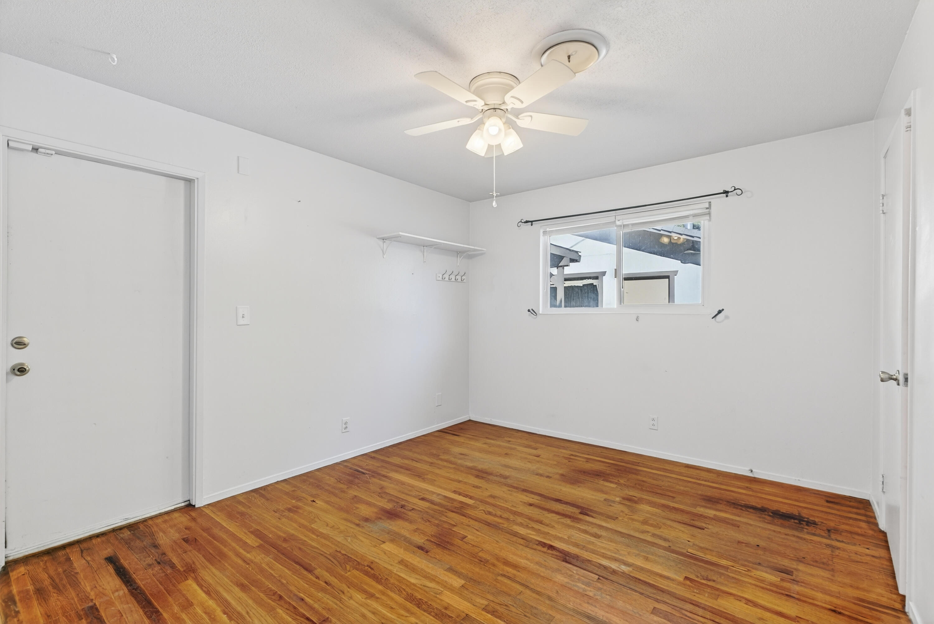 2068 Solar Way Redding, CA 96002 - Photo 21 of 36 a view of empty room with wooden floor