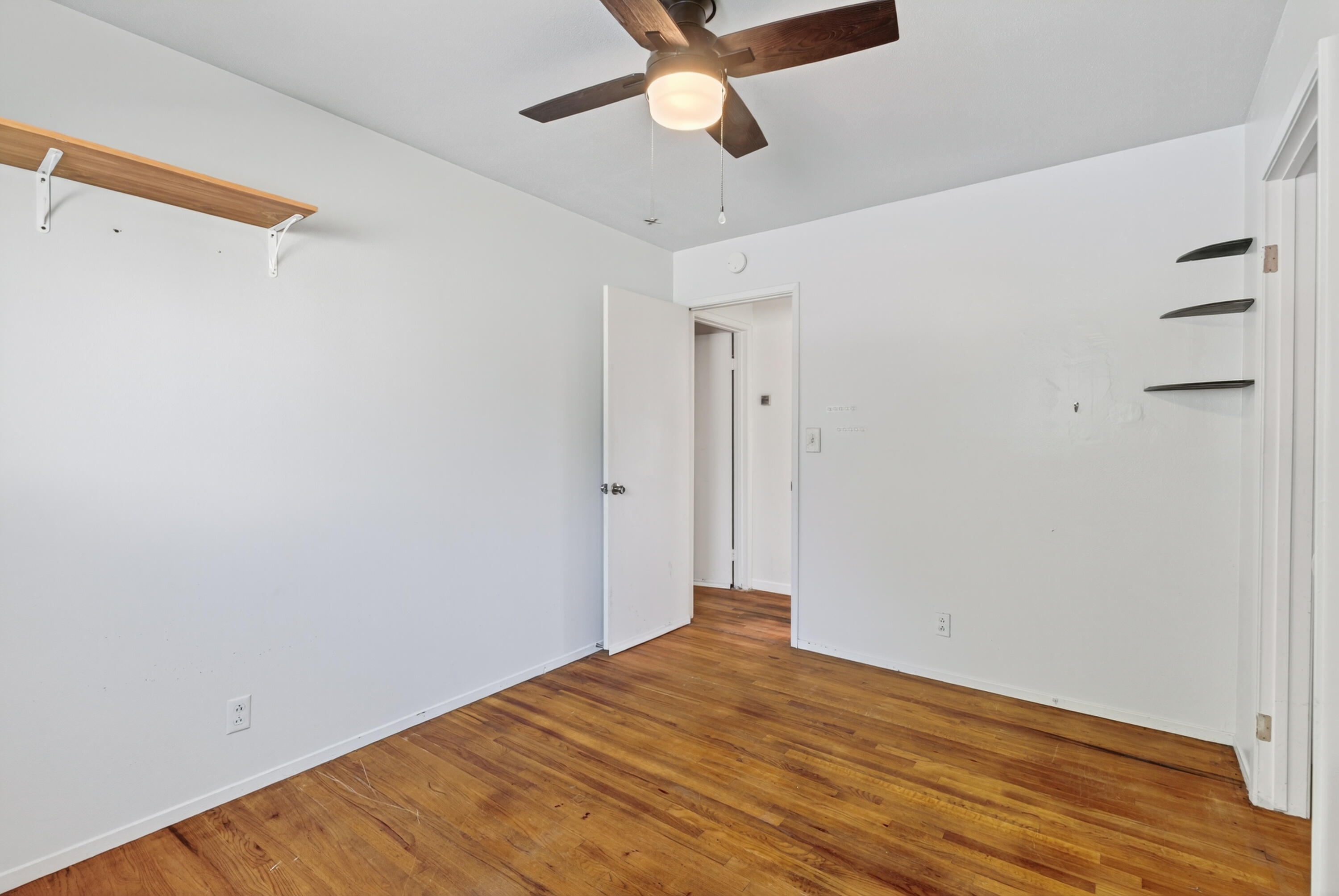 2068 Solar Way Redding, CA 96002 - Photo 25 of 36 a view of empty room with wooden floor