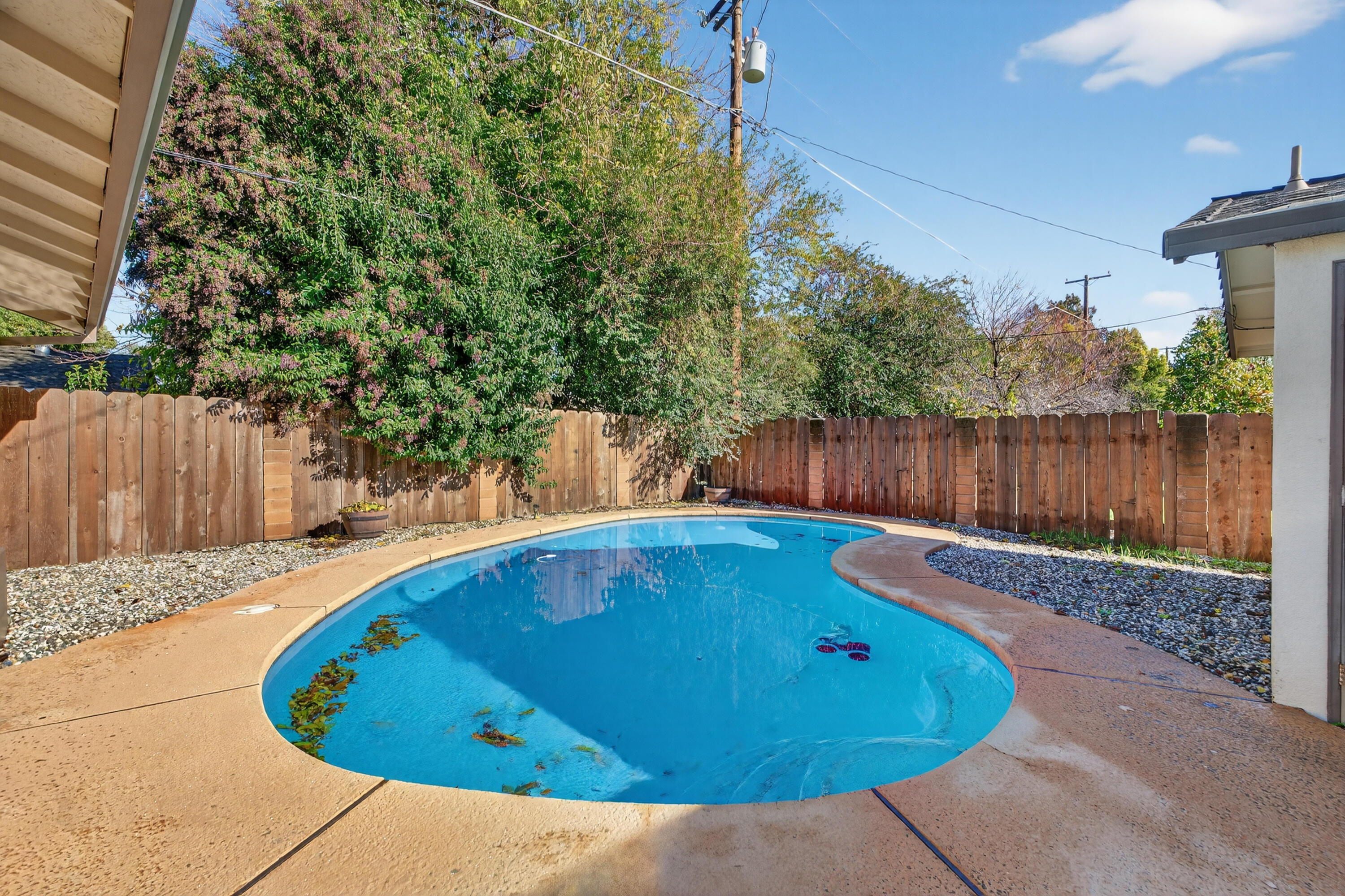 2068 Solar Way Redding, CA 96002 - Photo 33 of 36 a view of a swimming pool with a patio