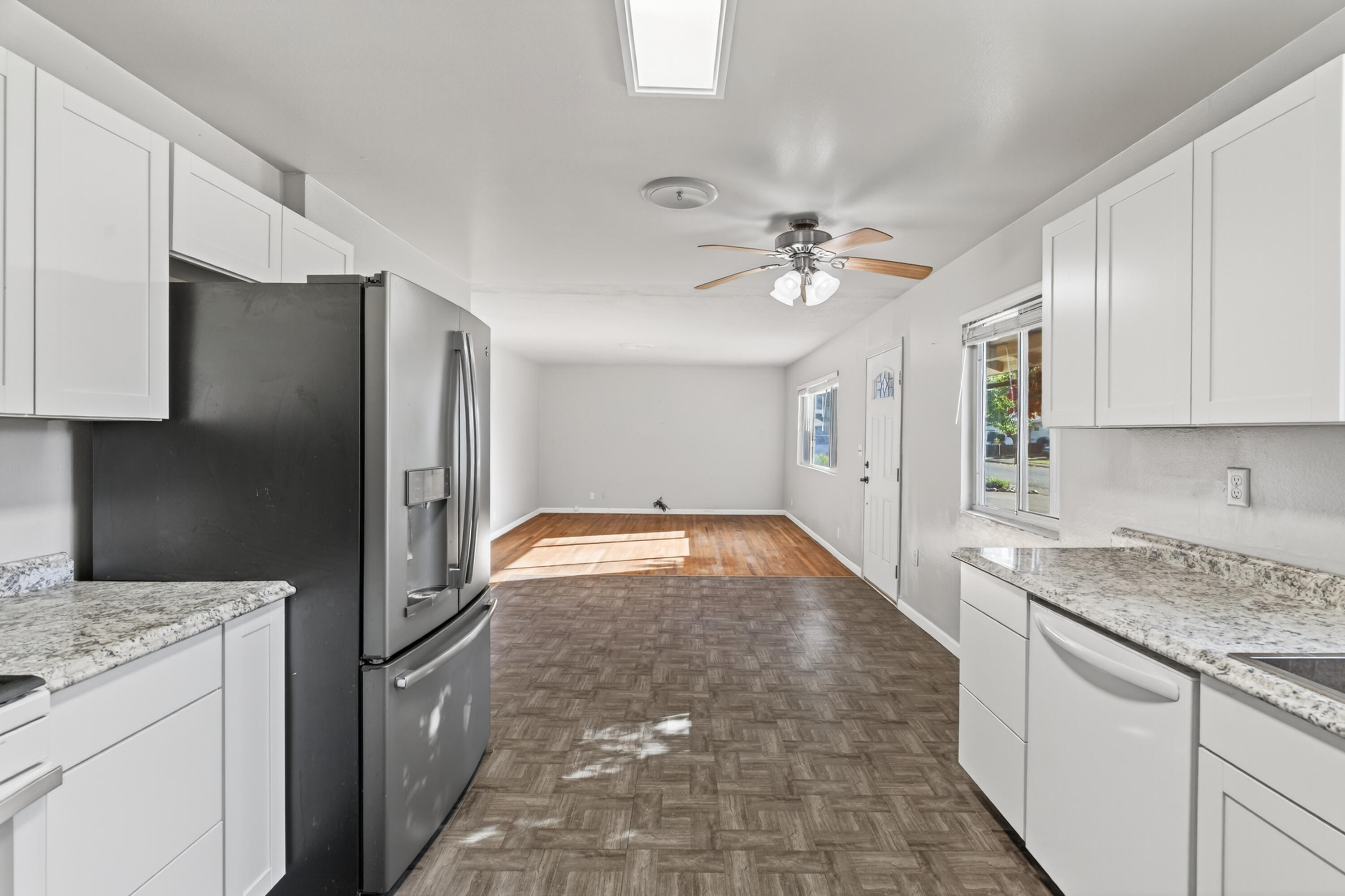 2068 Solar Way Redding, CA 96002 - Photo 9 of 36 a kitchen with stainless steel appliances granite countertop a refrigerator and a stove top oven
