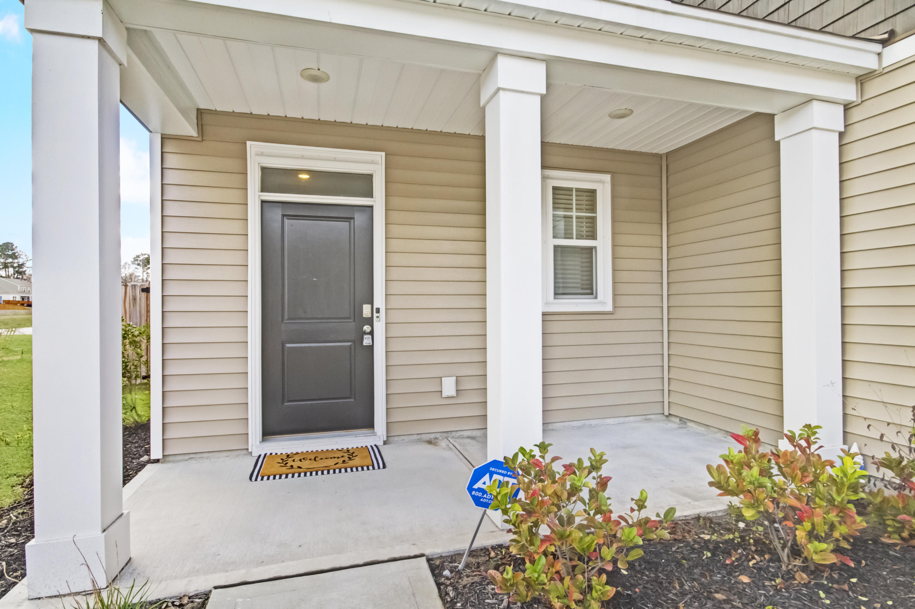 9673 Brandishing Road Ladson, SC 29456 - Photo 3 of 25 Covered Front Porch