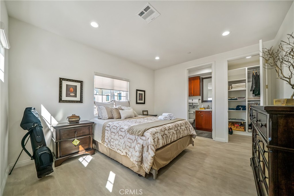 1101 North Maclay Avenue, Unit 1 San Fernando, CA 91340 - Photo 20 of 41 a bedroom with a bed and furniture