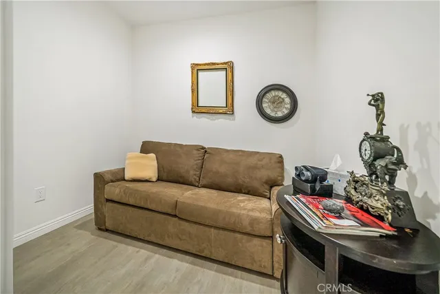 a bedroom with a bed and dresser