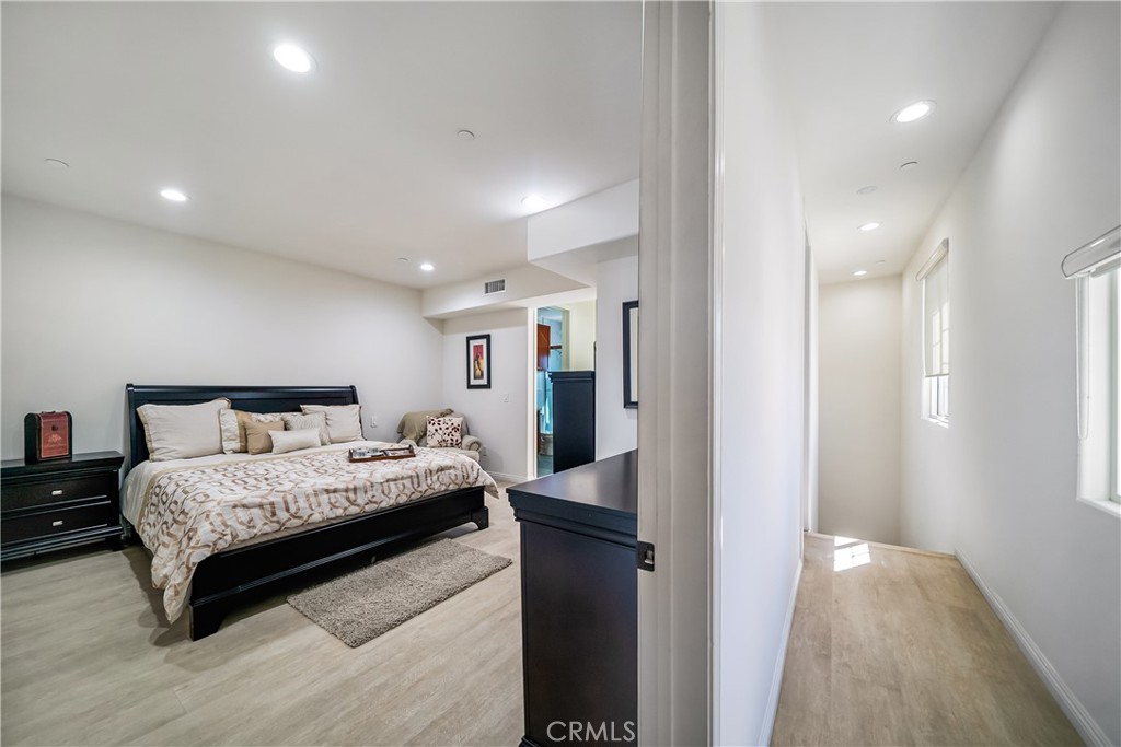 1101 North Maclay Avenue, Unit 1 San Fernando, CA 91340 - Photo 23 of 41 a bedroom with a bed and a view of bedroom
