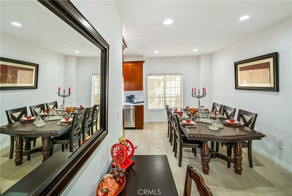 1101 North Maclay Avenue, Unit 1 San Fernando, CA 91340 - Photo 3 of 41 a view of a dining room with furniture and a table