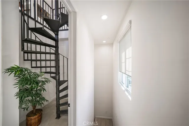 a bedroom with furniture and a desk