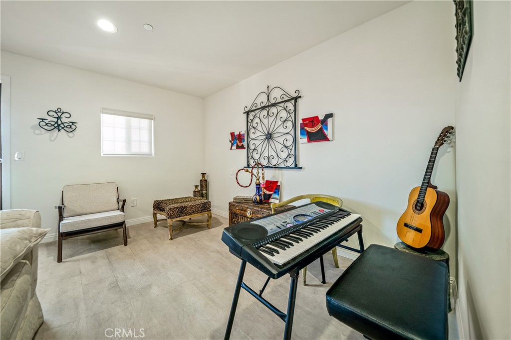 1101 North Maclay Avenue, Unit 1 San Fernando, CA 91340 - Photo 35 of 41 a bedroom with furniture and a desk