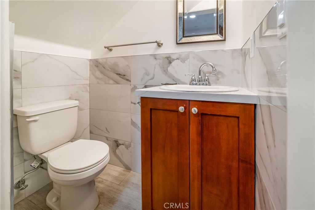 1101 North Maclay Avenue, Unit 1 San Fernando, CA 91340 - Photo 40 of 41 a bathroom with a toilet and a sink