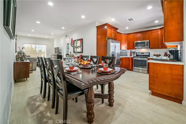 a kitchen with a stove and a sink
