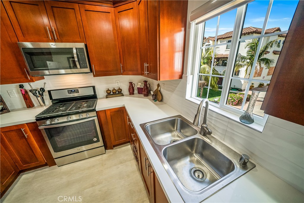 1101 North Maclay Avenue, Unit 1 San Fernando, CA 91340 - Photo 7 of 41 a kitchen with a stove and a sink