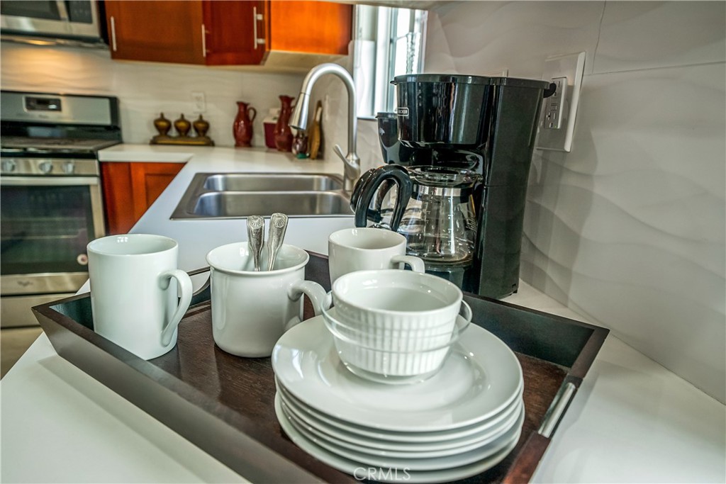 1101 North Maclay Avenue, Unit 1 San Fernando, CA 91340 - Photo 10 of 41 a kitchen with a sink and a stove