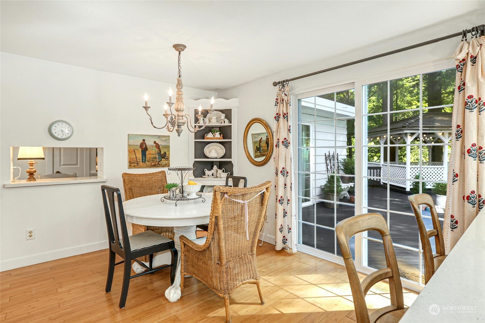 15629 Cascadian Way Bothell, WA 98012 - Photo 11 of 40 a view of a dining room with furniture and chandelier