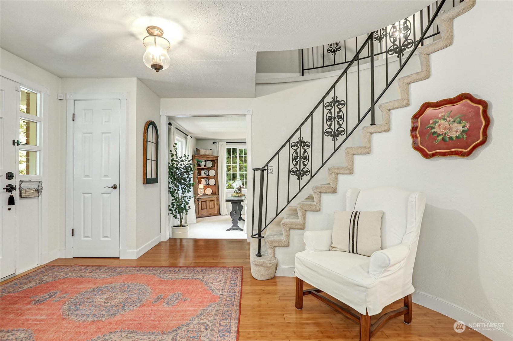 15629 Cascadian Way Bothell, WA 98012 - Photo 19 of 40 a view of entryway and hall with wooden floor