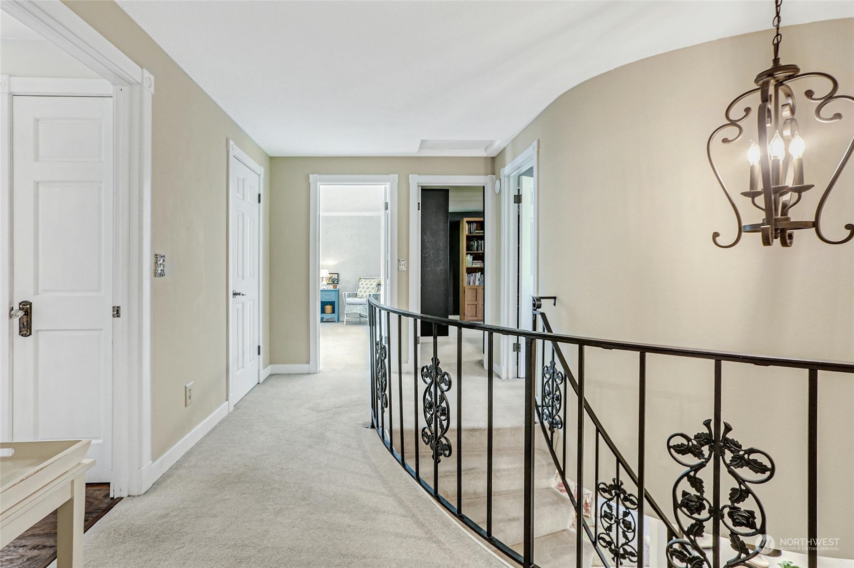 15629 Cascadian Way Bothell, WA 98012 - Photo 25 of 40 a view of a hallway with wooden floor