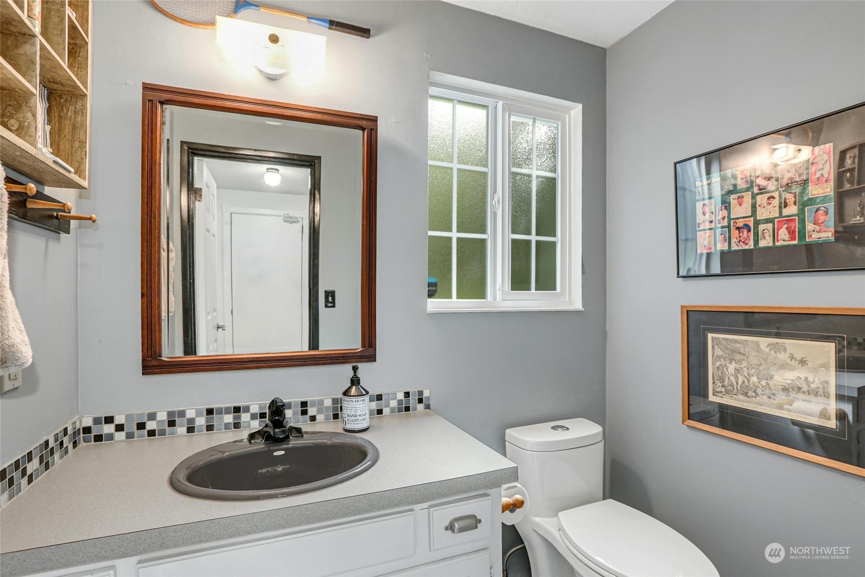 15629 Cascadian Way Bothell, WA 98012 - Photo 30 of 40 a bathroom with a toilet a sink and mirror