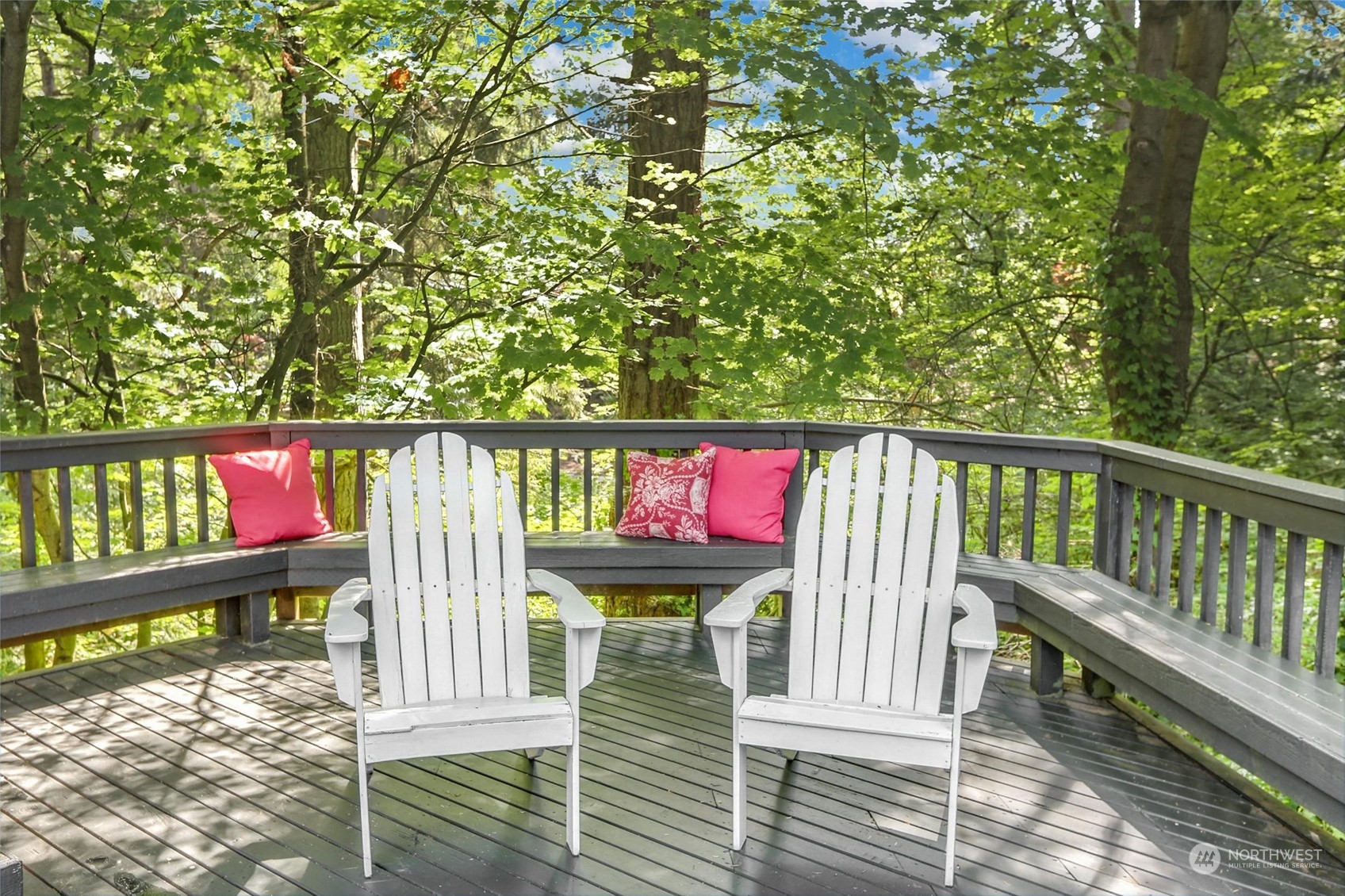 15629 Cascadian Way Bothell, WA 98012 - Photo 33 of 40 a view of a wooden deck with a bench