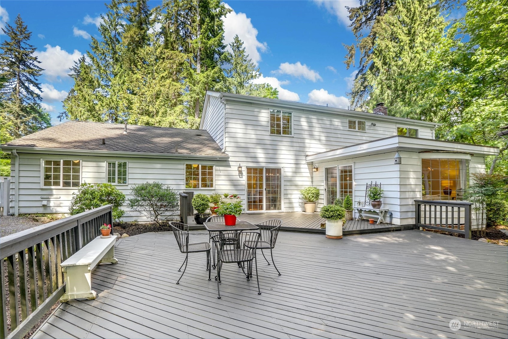 15629 Cascadian Way Bothell, WA 98012 - Photo 35 of 40 a view of a house with a porch and furniture