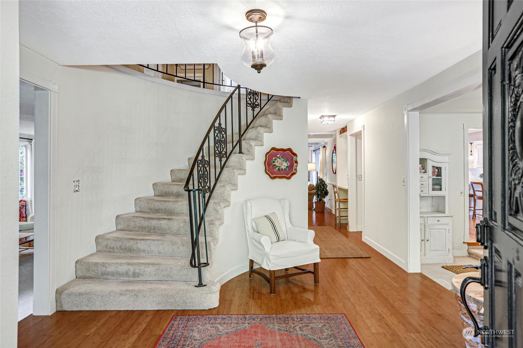 15629 Cascadian Way Bothell, WA 98012 - Photo 5 of 40 a view of entryway dining room and hall with wooden floor