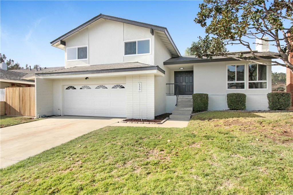550 Termino Avenue Corona, CA 92879 - Photo 2 of 20 a bathroom with a sink and mirror