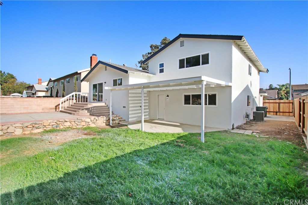 550 Termino Avenue Corona, CA 92879 - Photo 20 of 20 a front view of a house with a yard and garage