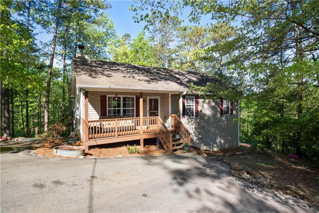 333 Old Acworth Road Dallas, GA 30132 - Photo 1 of 1 a front view of a house with a garden