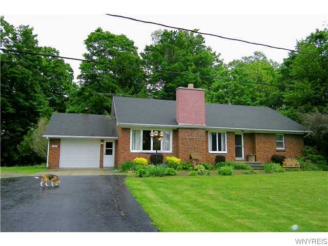 12837 Springville Boston Road Concord, NY 14141 - Photo 1 of 1 Exterior Front. All brick ranch with 2.63 wooded a