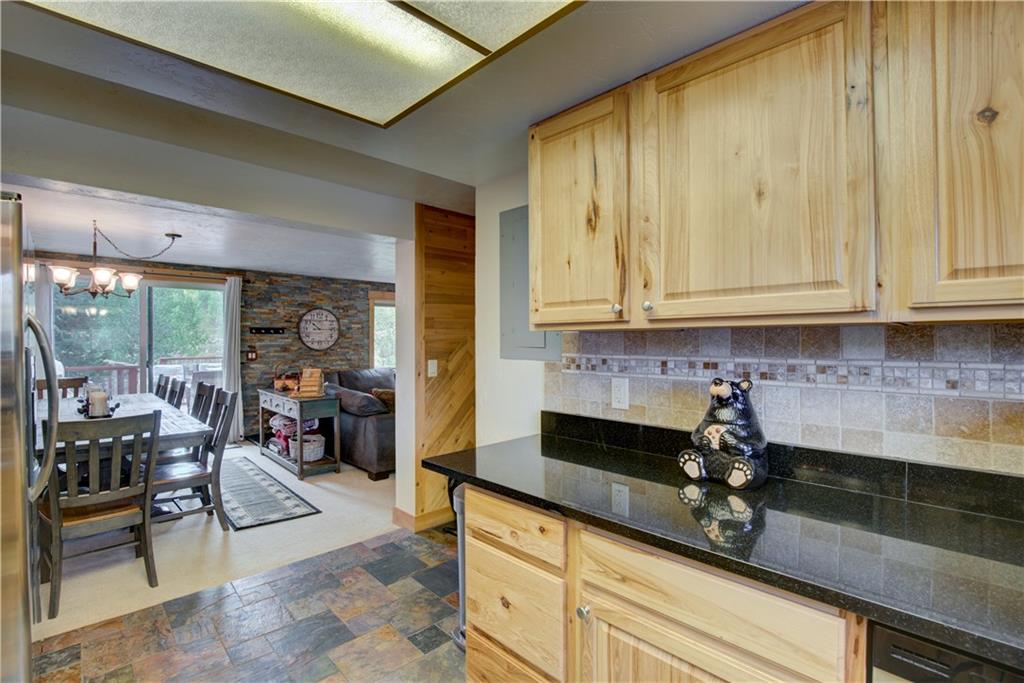 142 Poplar Circle Silverthorne, CO 80498 - Photo 14 of 35 a kitchen with a sink and cabinets