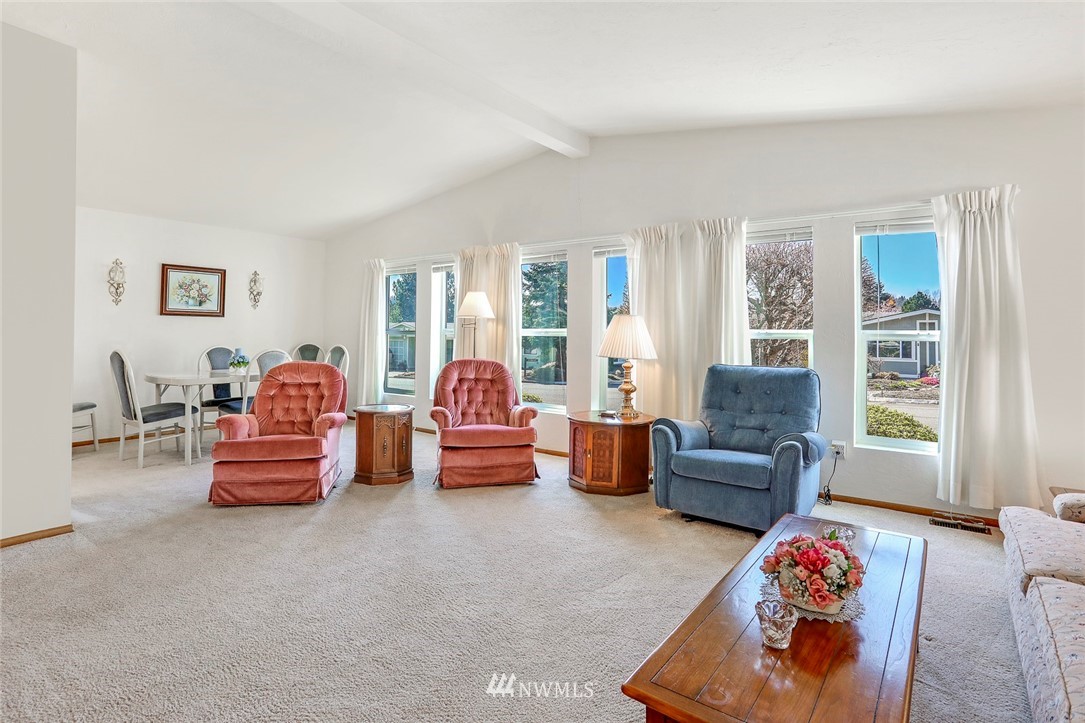 24111 8th Place West Bothell, WA 98021 - Photo 11 of 34 a bedroom with furniture and a couch
