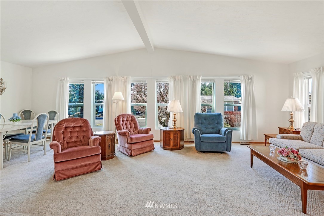 24111 8th Place West Bothell, WA 98021 - Photo 14 of 34 a living room with furniture and a large window