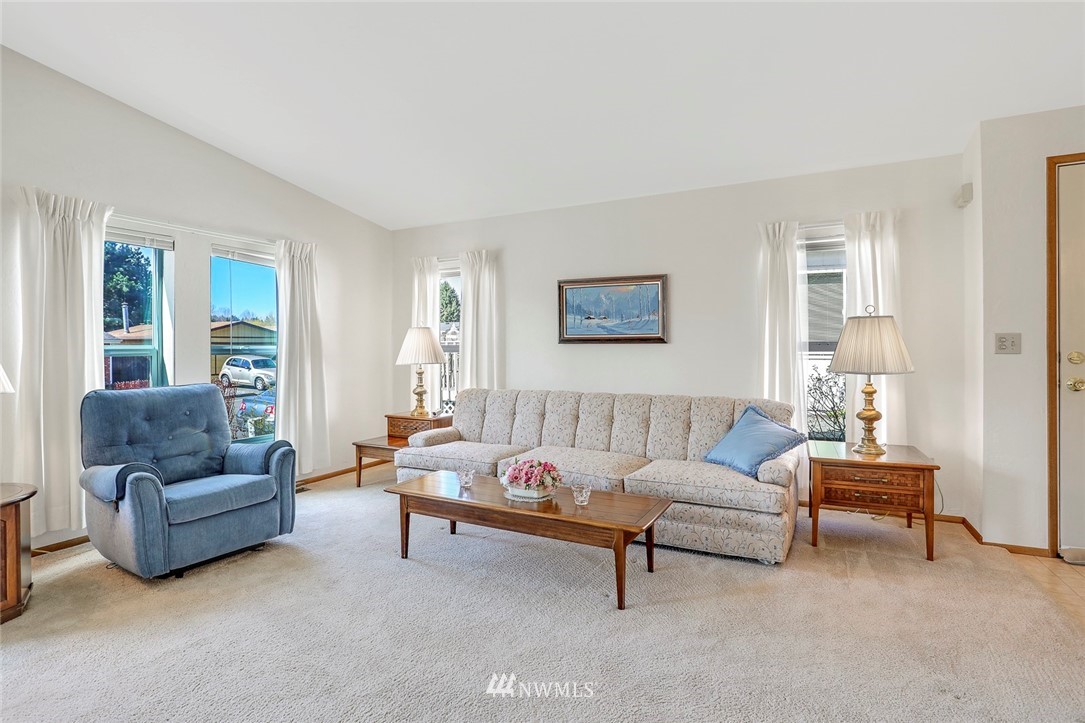 24111 8th Place West Bothell, WA 98021 - Photo 16 of 34 a living room with furniture and a potted plant