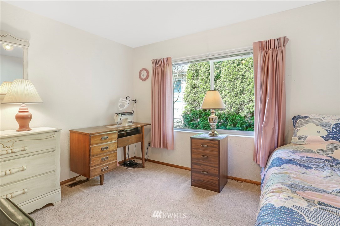 24111 8th Place West Bothell, WA 98021 - Photo 26 of 34 a bedroom with a bed and a window