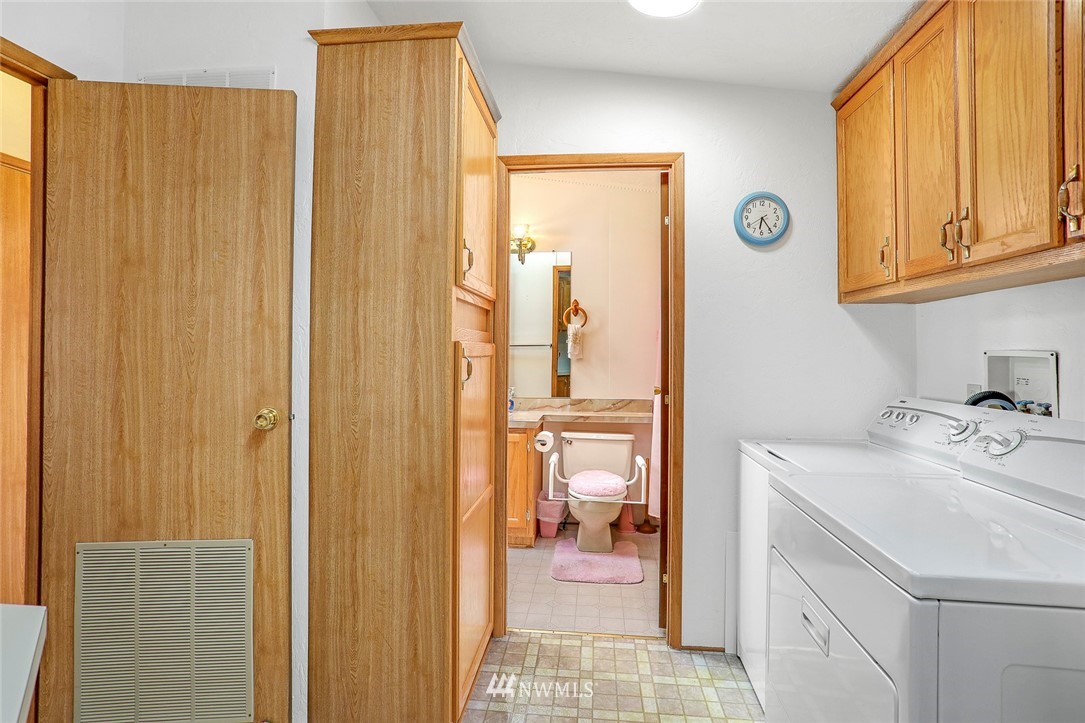 24111 8th Place West Bothell, WA 98021 - Photo 28 of 34 a bathroom with a sink and a mirror