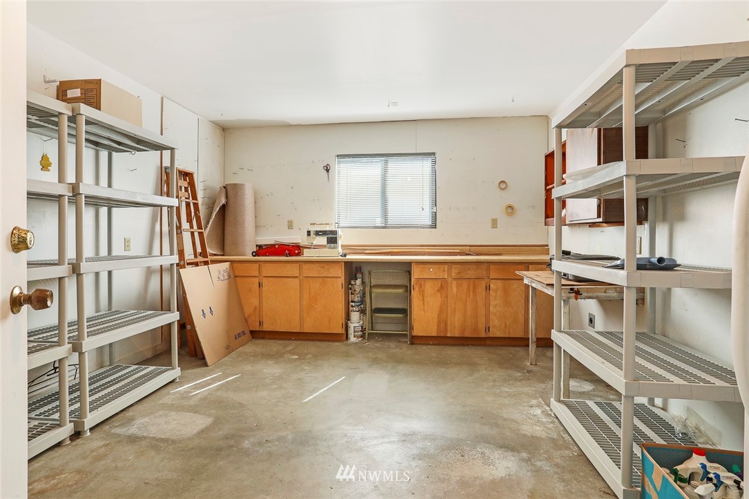 24111 8th Place West Bothell, WA 98021 - Photo 33 of 34 a kitchen that has a sink and cabinets