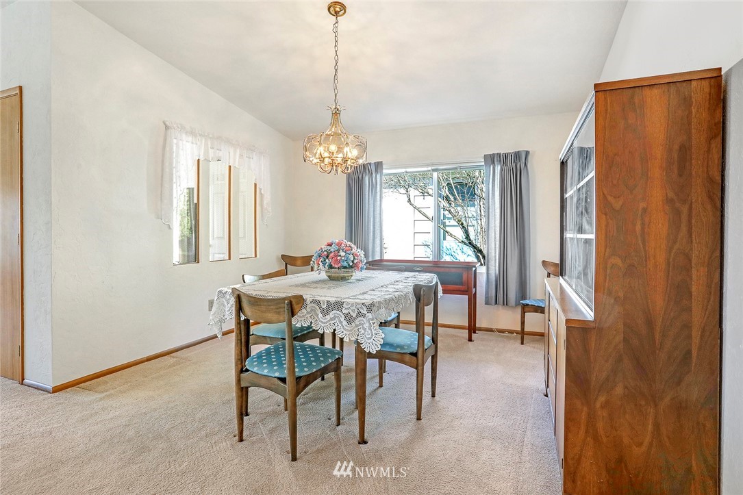 24111 8th Place West Bothell, WA 98021 - Photo 10 of 34 a view of a dining room with furniture window and outside view