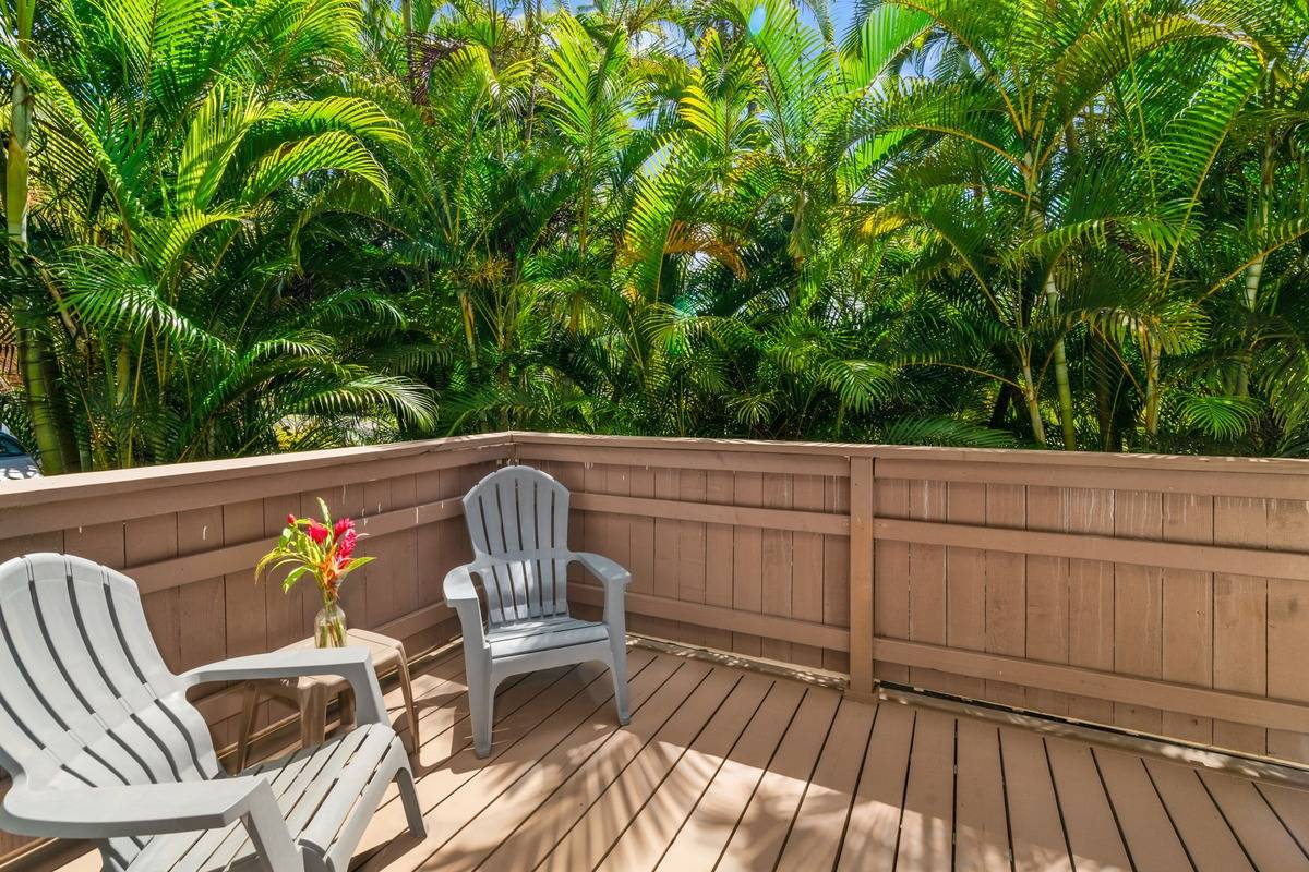4480 Ka Haku Road, Unit 105 Princeville, HI 96722 - Photo 18 of 25 a view of balcony with wooden floor and outdoor seating
