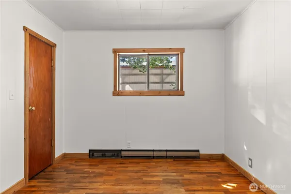 a view of an empty room with a balcony