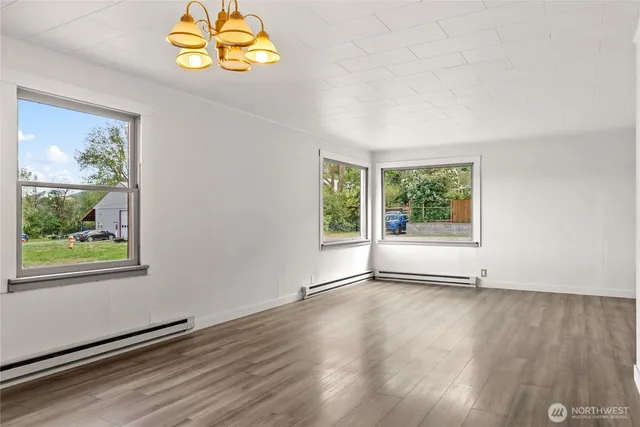 a view of a room with wooden walls