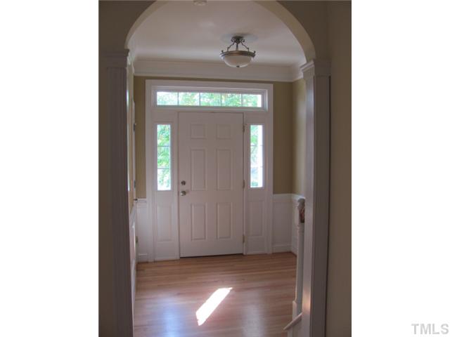 2245 Bellaire Avenue Raleigh, NC 27608 - Photo 3 of 14 Nice wide foyer with archway to living and dining