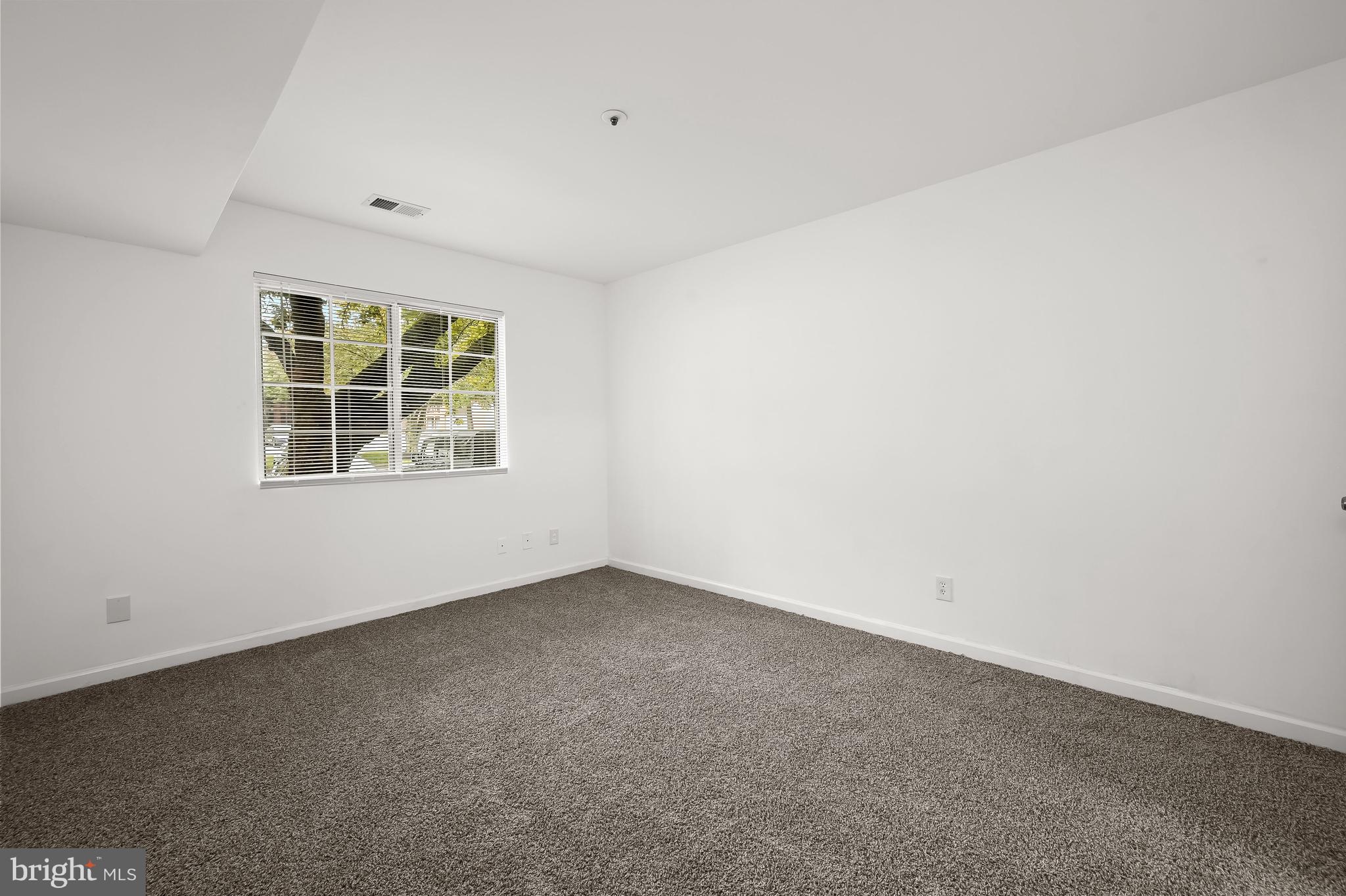 4904 Columbia Road, Unit 1 Columbia, MD 21044 - Photo 14 of 29 Spacious bedroom with new carpet